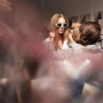 Backstage Action - The hive of activity backstage at the Burberry Prorsum SS14 womenswear show