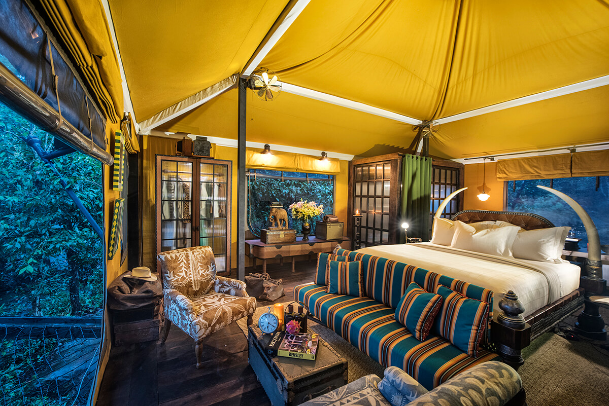 Colourful interior design of luxury safari tent in the Cambodian jungle