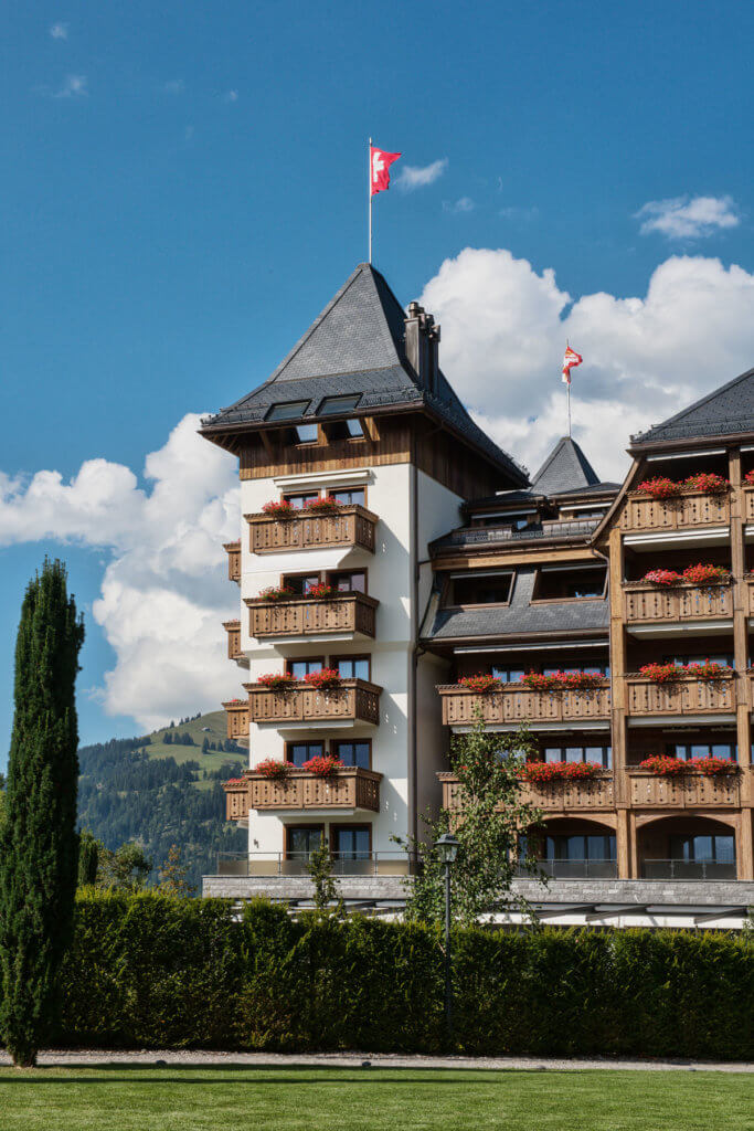 Chalet style hotel the Alpina Gstaad in the summertime