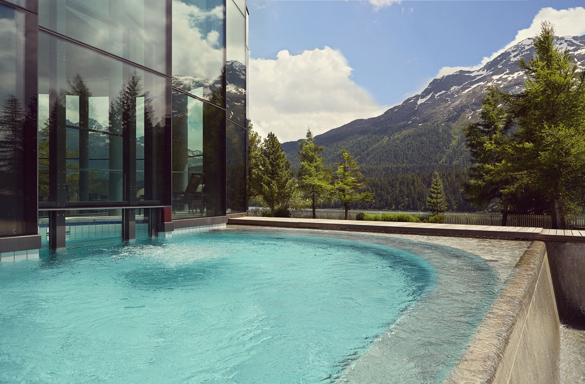 Outdoor swimming pool at five star hotel in the Swiss Alps