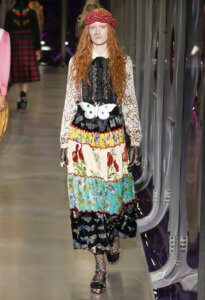 Luxury brand Gucci on the runway showcasing pre-fall 2017 collection