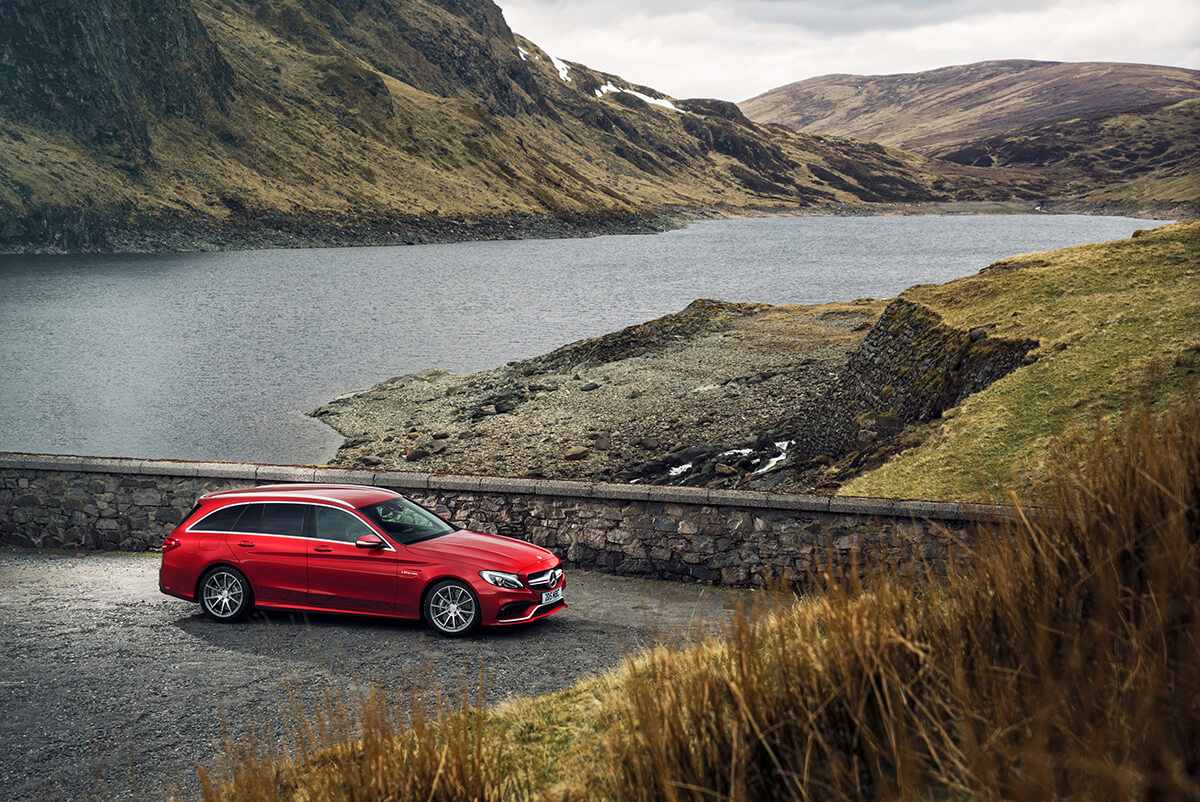 Mercedes-AMG C 63 Estate driving through rural landscapes 