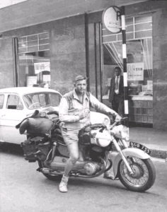 a young geoffrey kent pictured on his motorcycle adventure