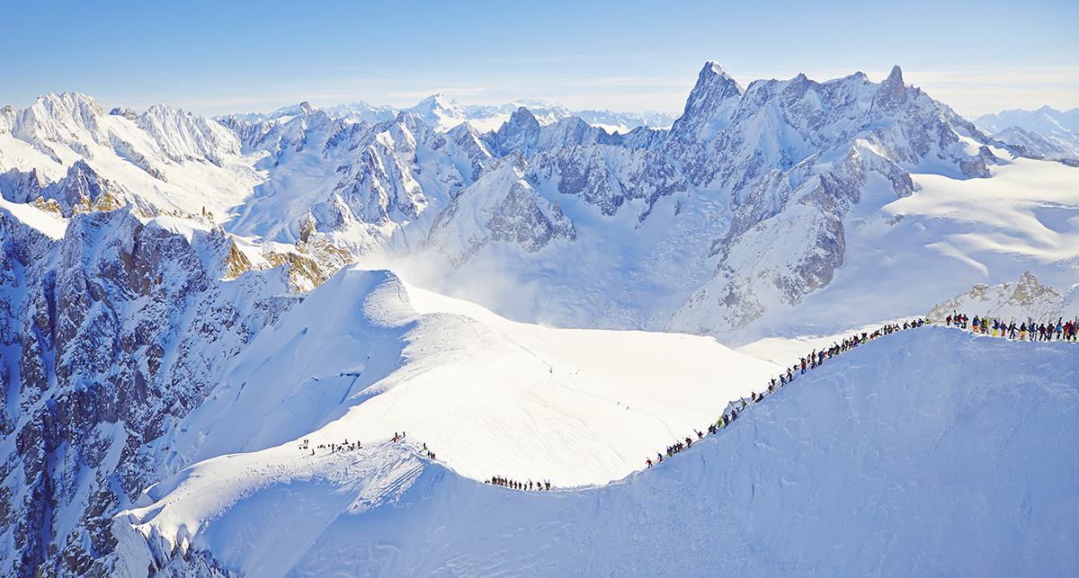 Skiiers descending the famous off-piste route, Vallée Blanche in Chamonix