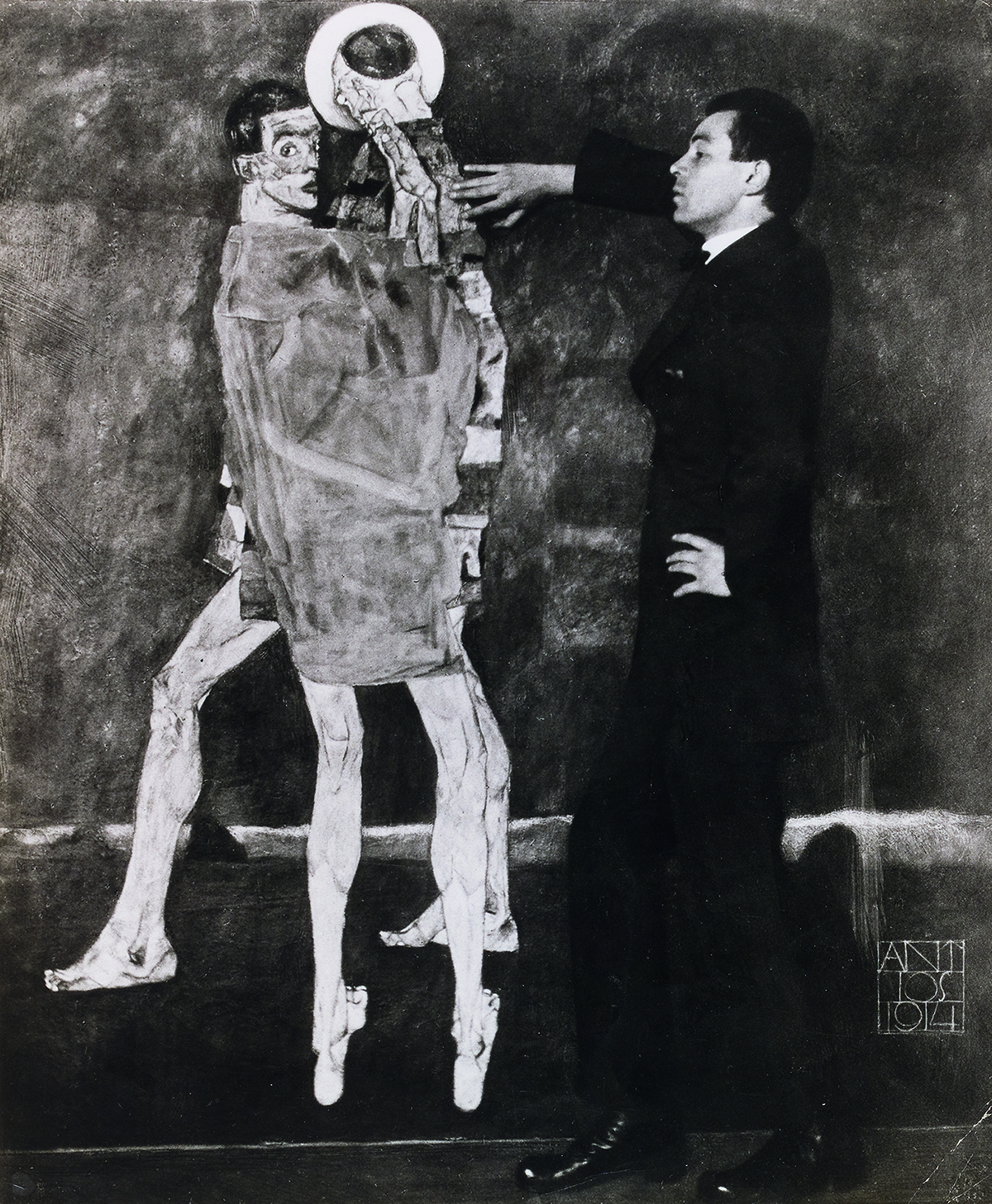 Black and white photograph of Egon Schiele with one of his paintings