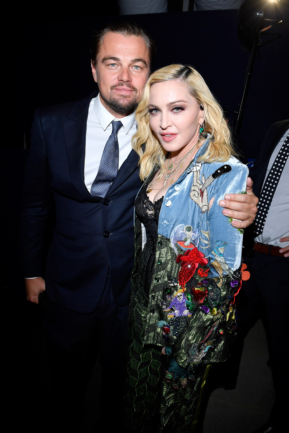 Actor Leonardo DiCaprio and Madonna pose backstage