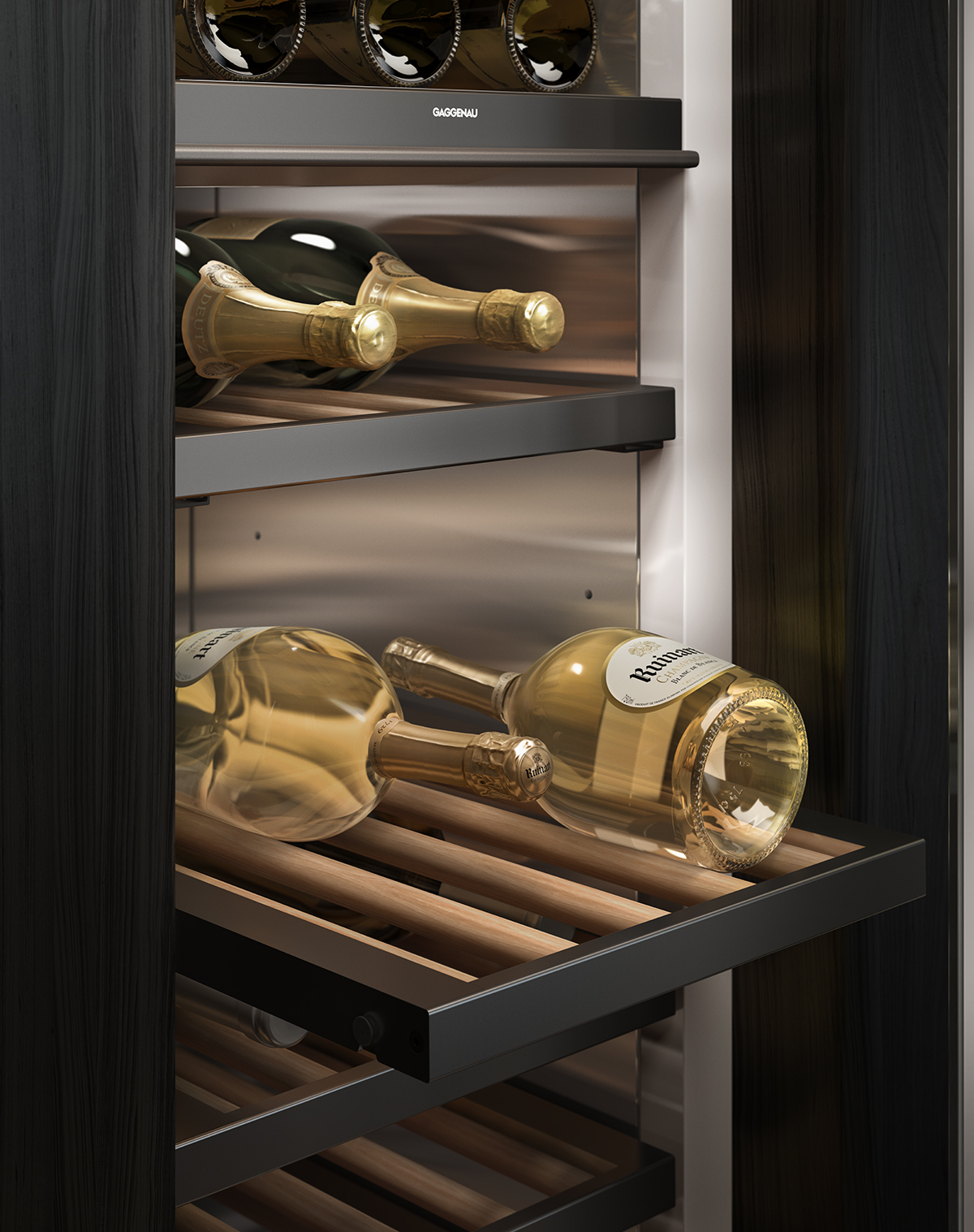 close up photograph of wine cabinet drawers containing bottles of champagne