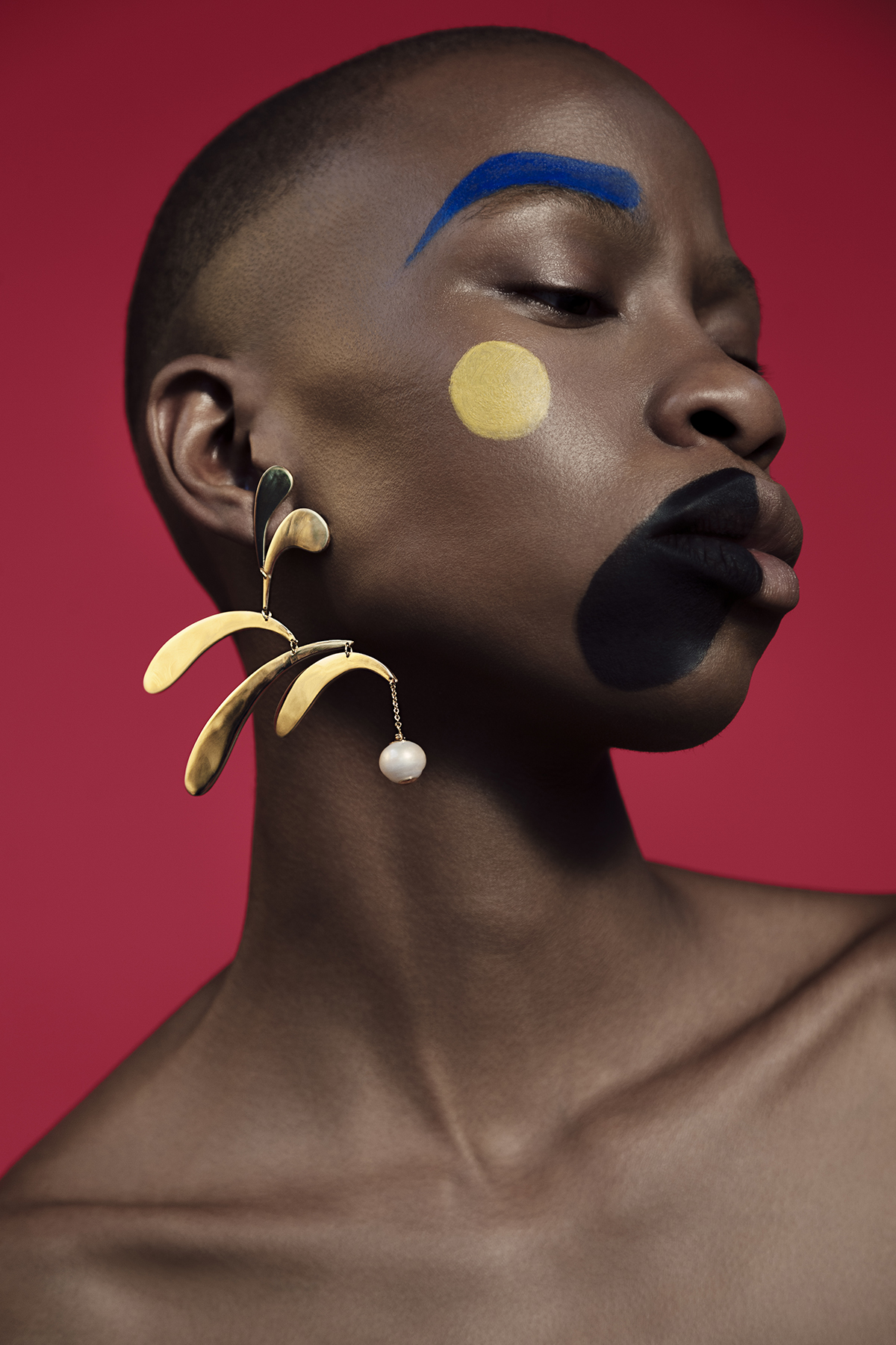 Gold statement earring by Anissa Kermiche, Parisian jewellery designer