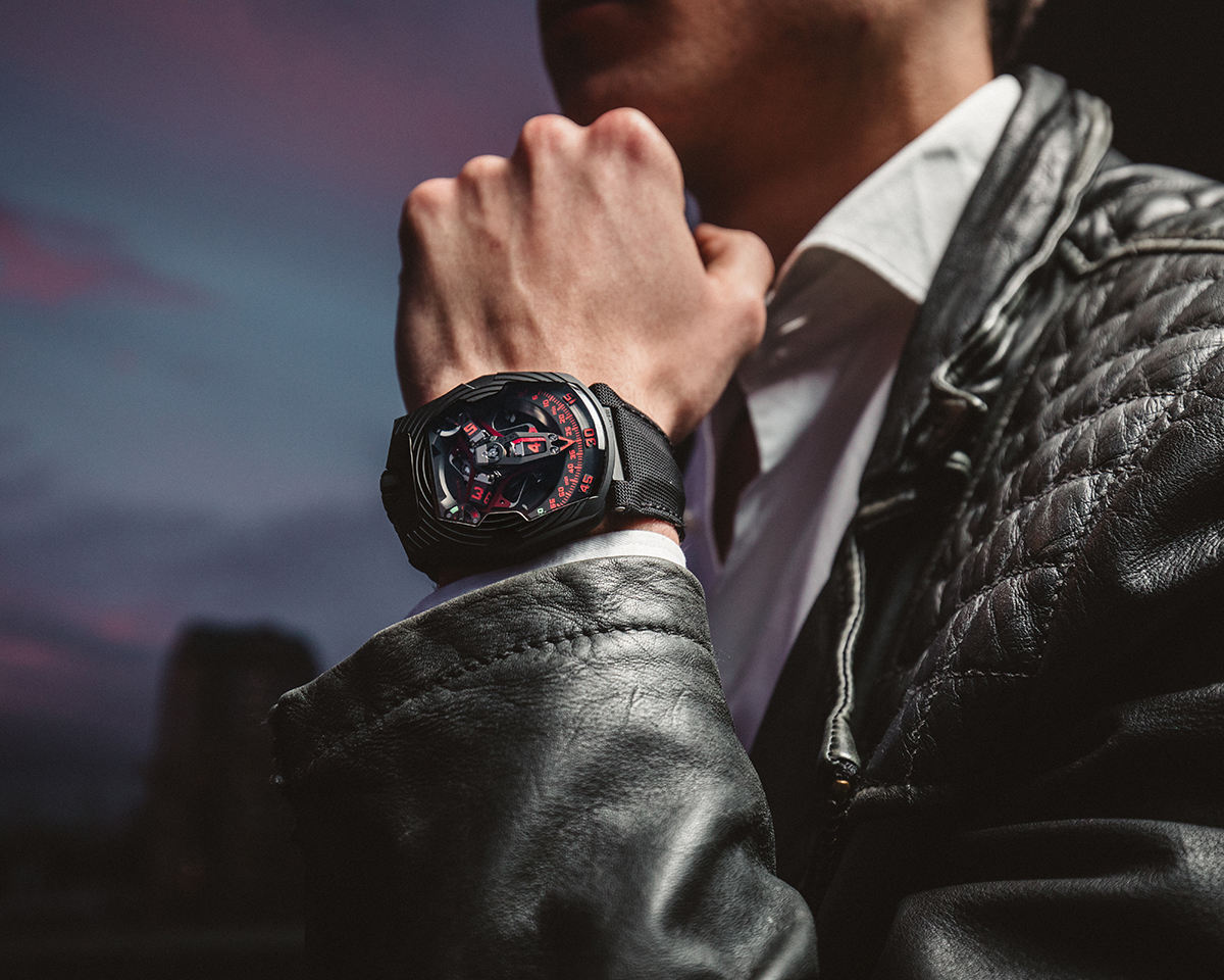Luxury men's watch with black and red dial