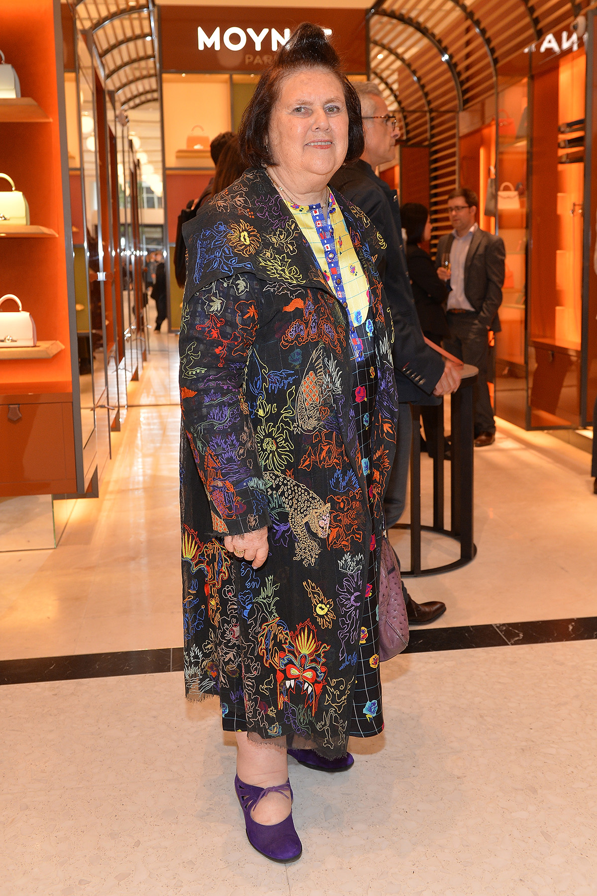 Suzy Menkes Vogue Editor in wearing floral dress and heels