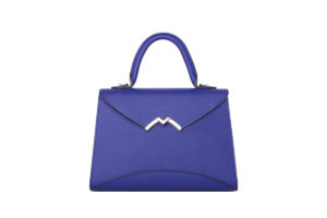 blue leather handbag with stiff handle and silver "m" shaped clasp