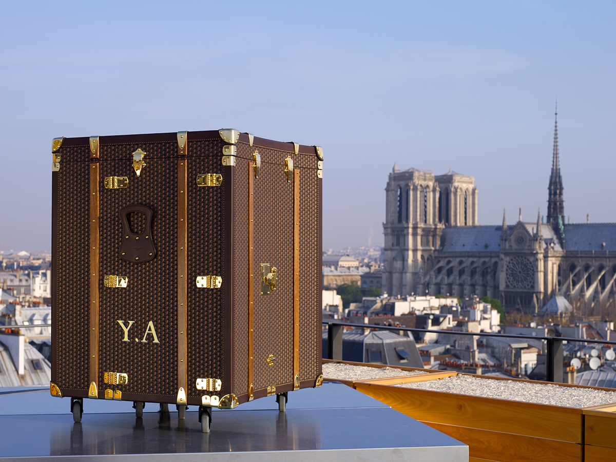 Moynat trunk pictured in Paris in front of the Notre Dame