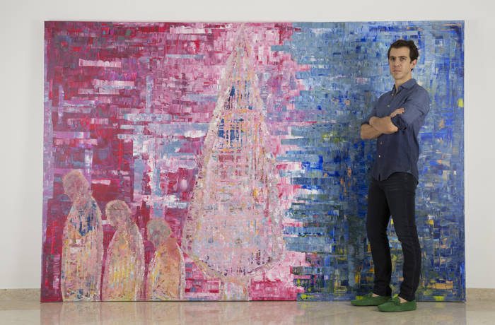 large abstract painting in pink and blue colours with artist Sassan Behnam Bakhtiar on right handside