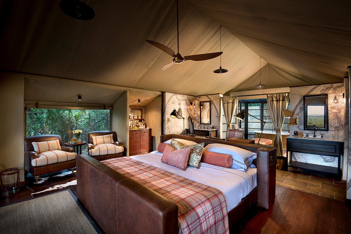 luxury safari tent with large double bed and plush furnishings