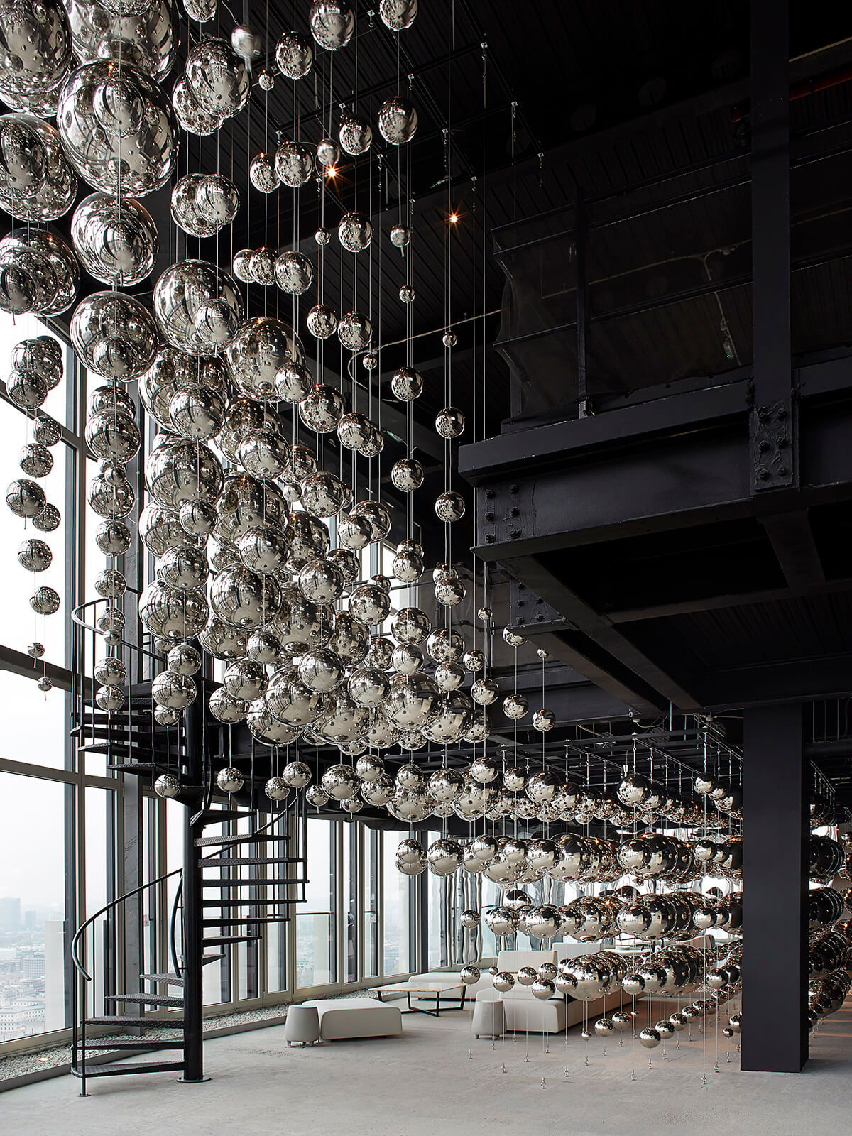 Installation of lines of hanging silver balls