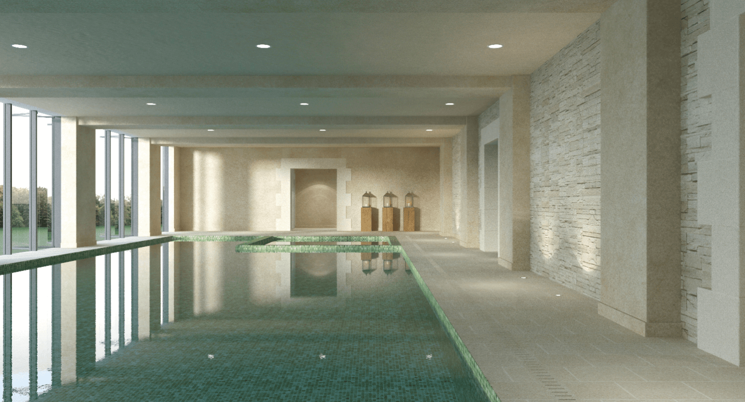 Large indoor swimming pool surrounded by white marble