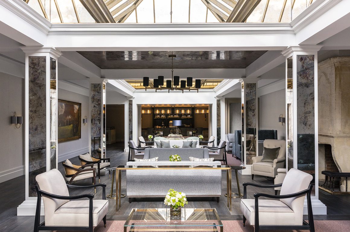 large contemporary lounge area with sofas and armchairs