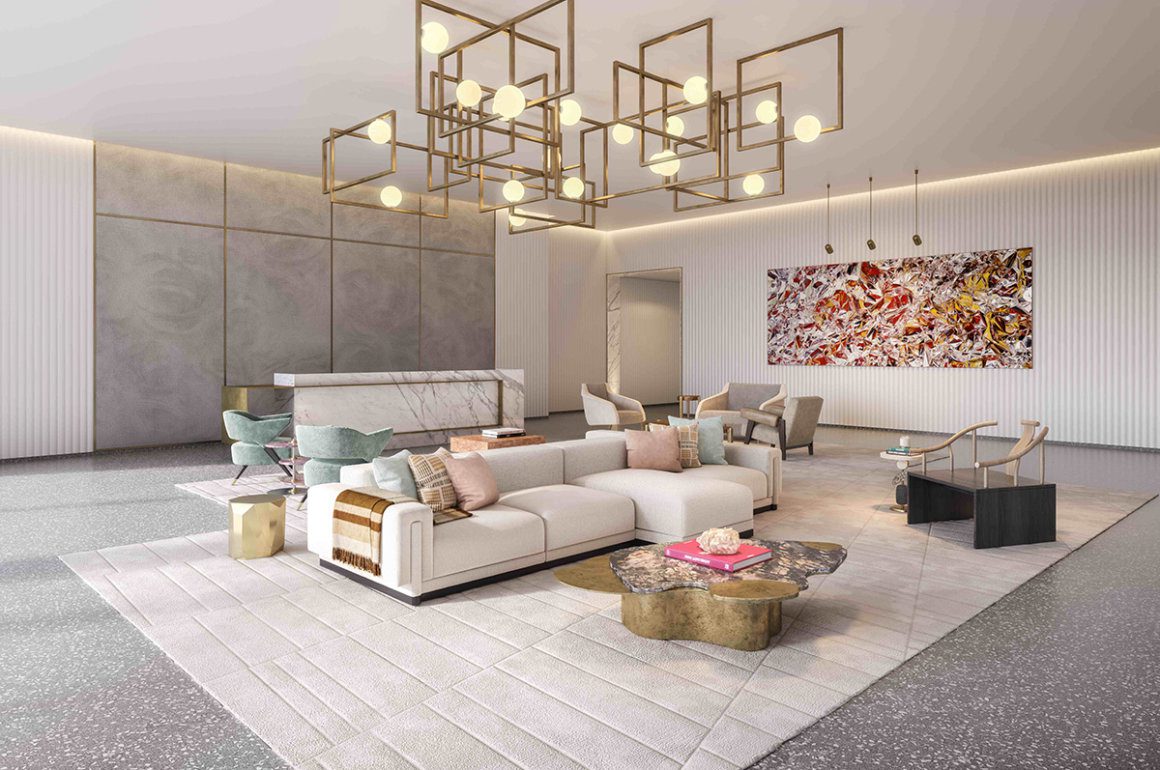 Smart contemporary lobby area with cream sofas and modern light fitting