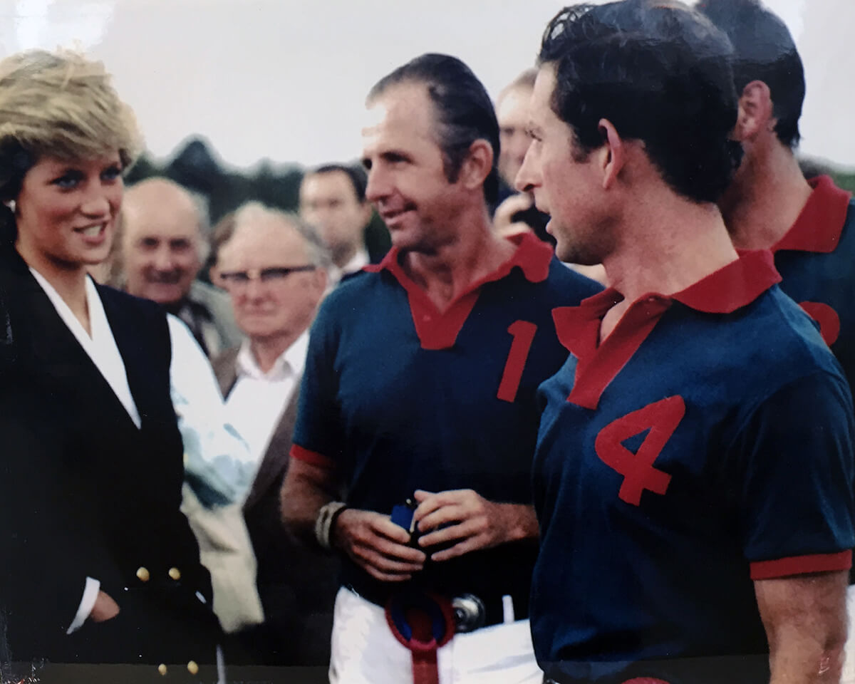 Princess Diana, Prince Charles and a young Geoffrey Kent speaking post polo match