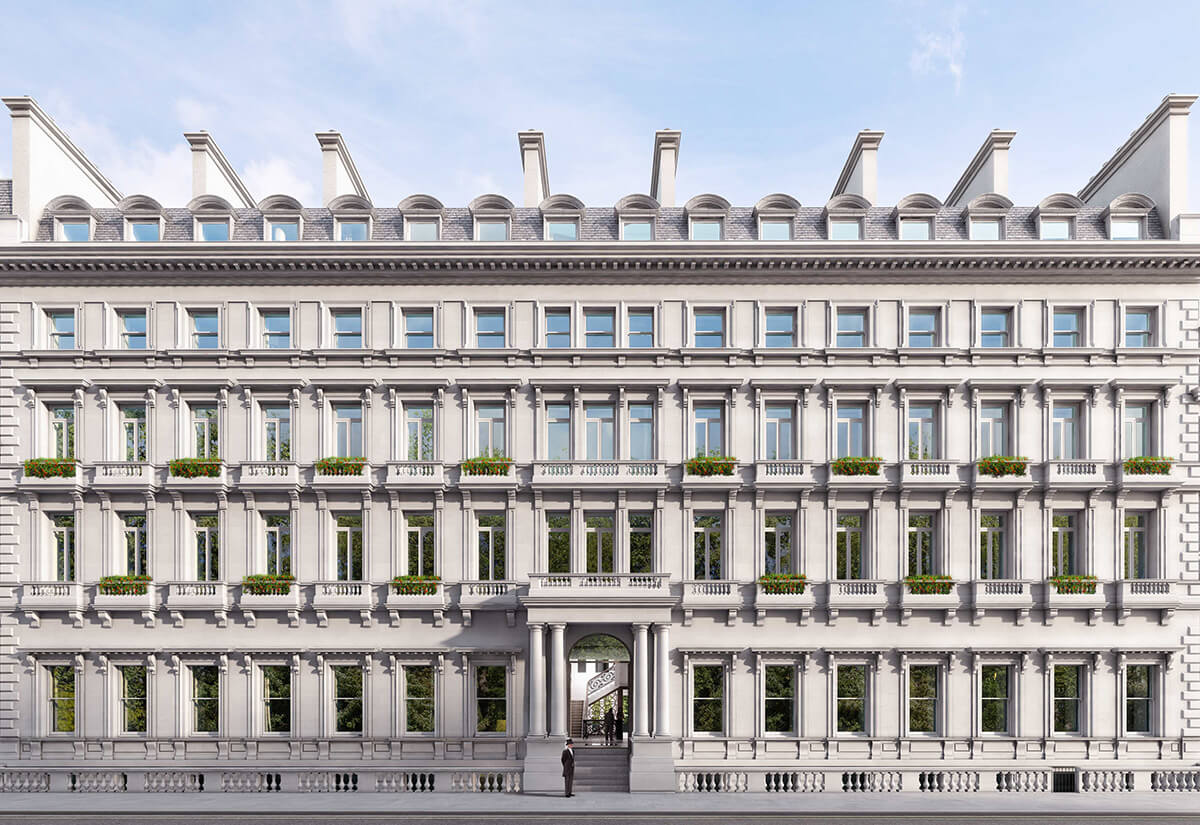 Facade of grand residential building in classical style with columned entrance