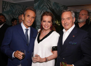 Colour portrait of Caroline and Karl-Friedrich Scheufele with Jacky Ickx