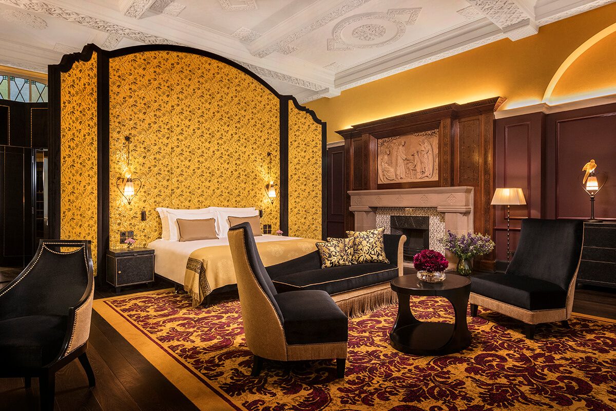 Luxury hotel bedroom with plush gold fabrics 