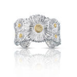 Silver and gold cuff of daisies