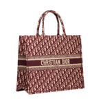 Red and cream tote bag by Christian Dior