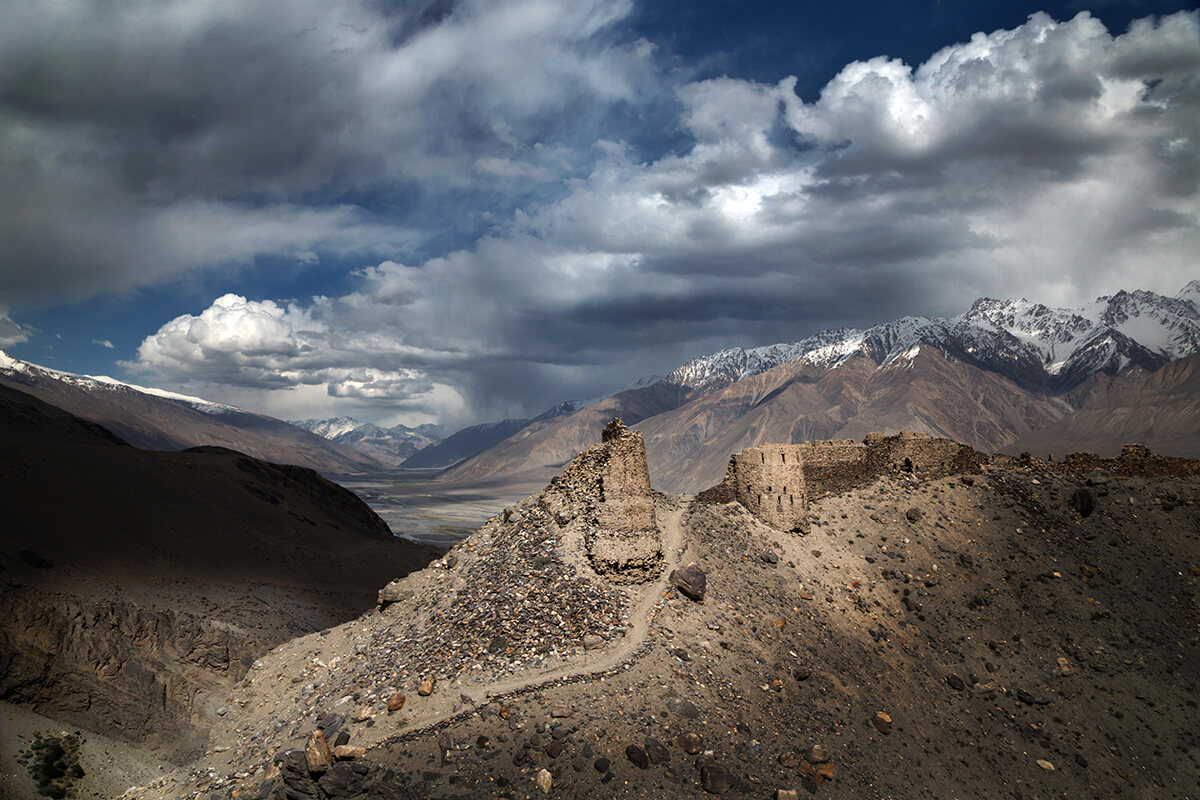 An ancient fortress on top of a mountain in Tajikistan