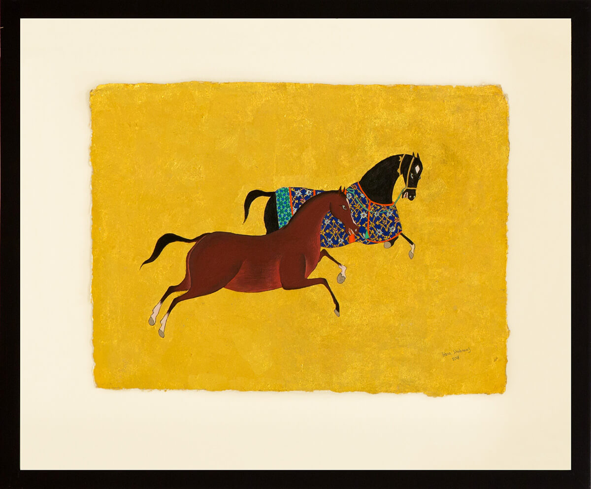 Miniature painting of two horses galloping on a golden painted background