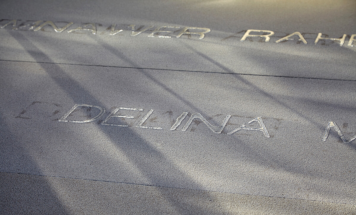 Image of concrete floor with letters spelt out on the surface