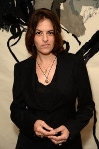 Portrait of artist Tracey Emin wearing a black blazer and top
