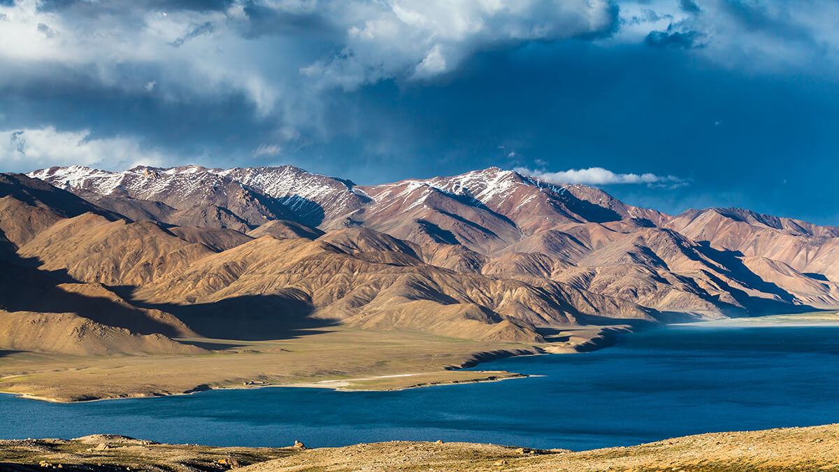 Glacier lake surrounded by mountains