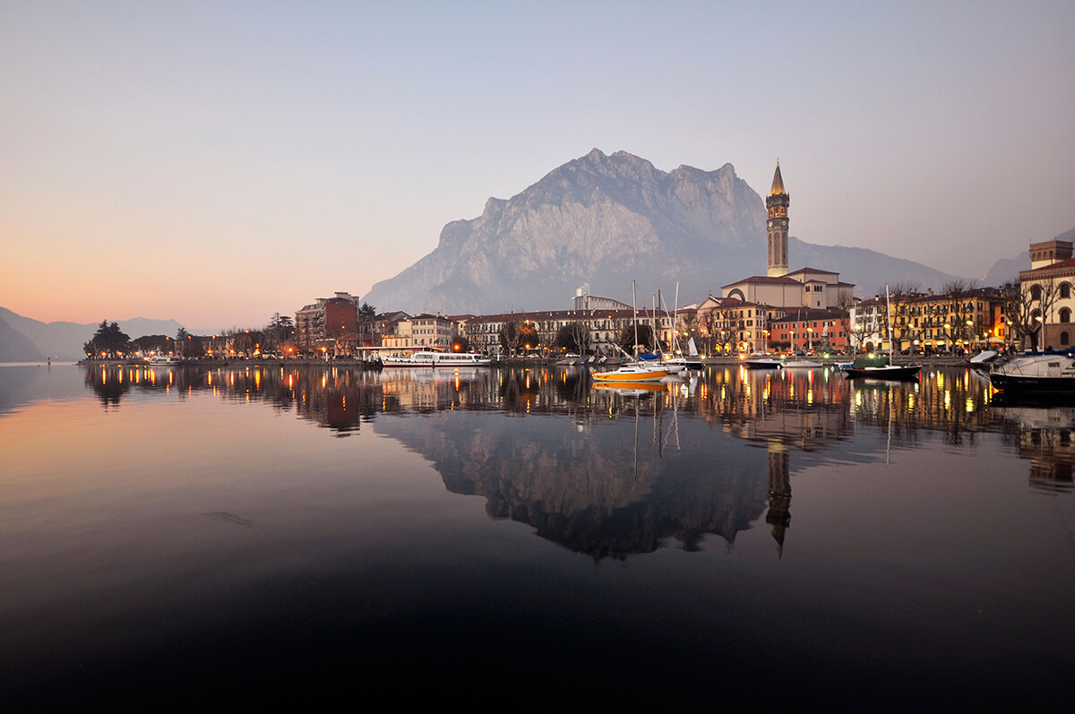 The picturesque town of Lecco on Lake Como pictured at sunset