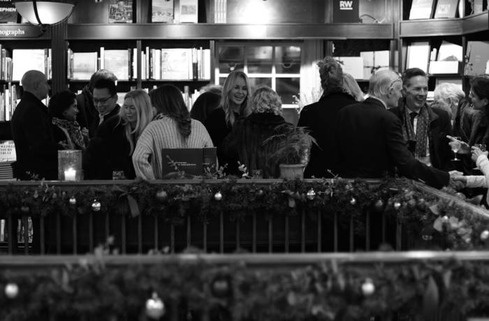 Book launch at Hatchard's London with Christmas decorations and guests chatting