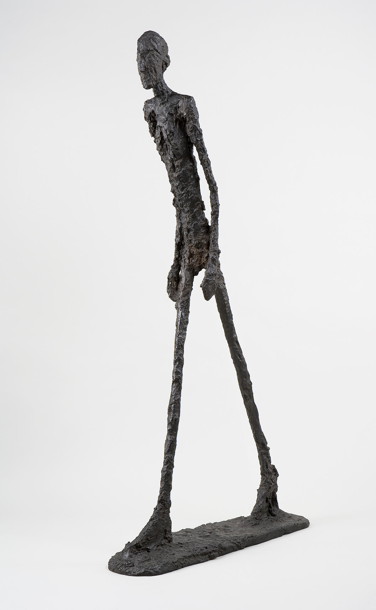 walking man sculpture by swiss artist Alberto Giacometti