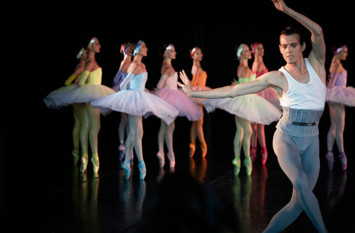 Ballet dancers in performance with a male lead