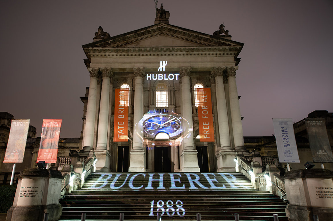 Hublot logo projected onto Tate Modern facade with Bucherer
