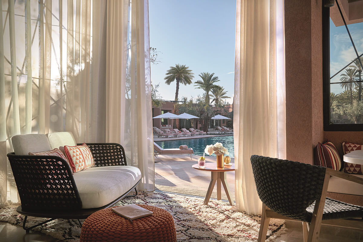 Luxury poolside cabana with plush seating