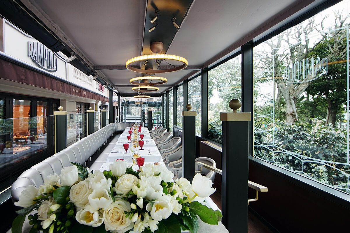 Luxury dining room with large windows into the gardens