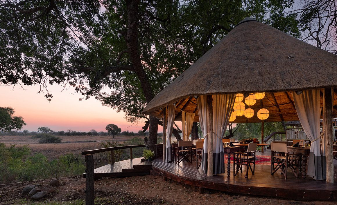 South african open air safari camp pictured at night