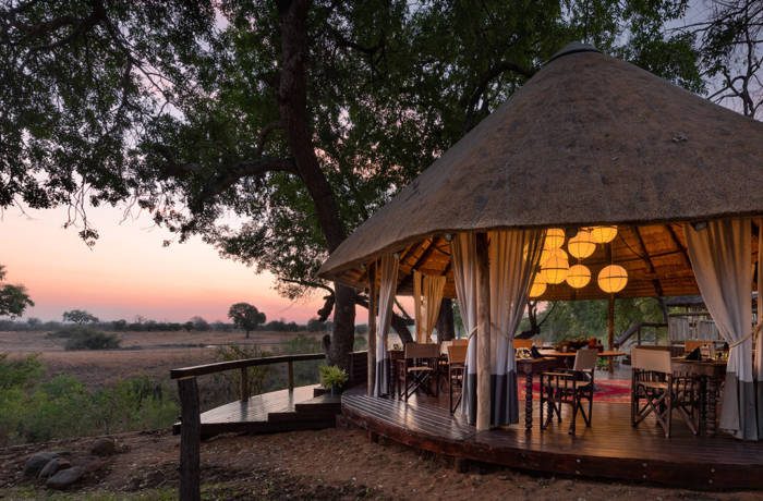 South african open air safari camp pictured at night