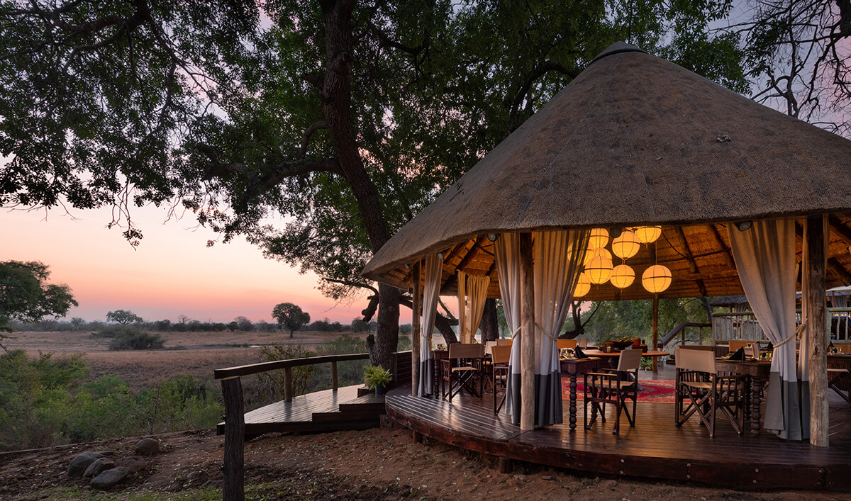 South african open air safari camp pictured at night