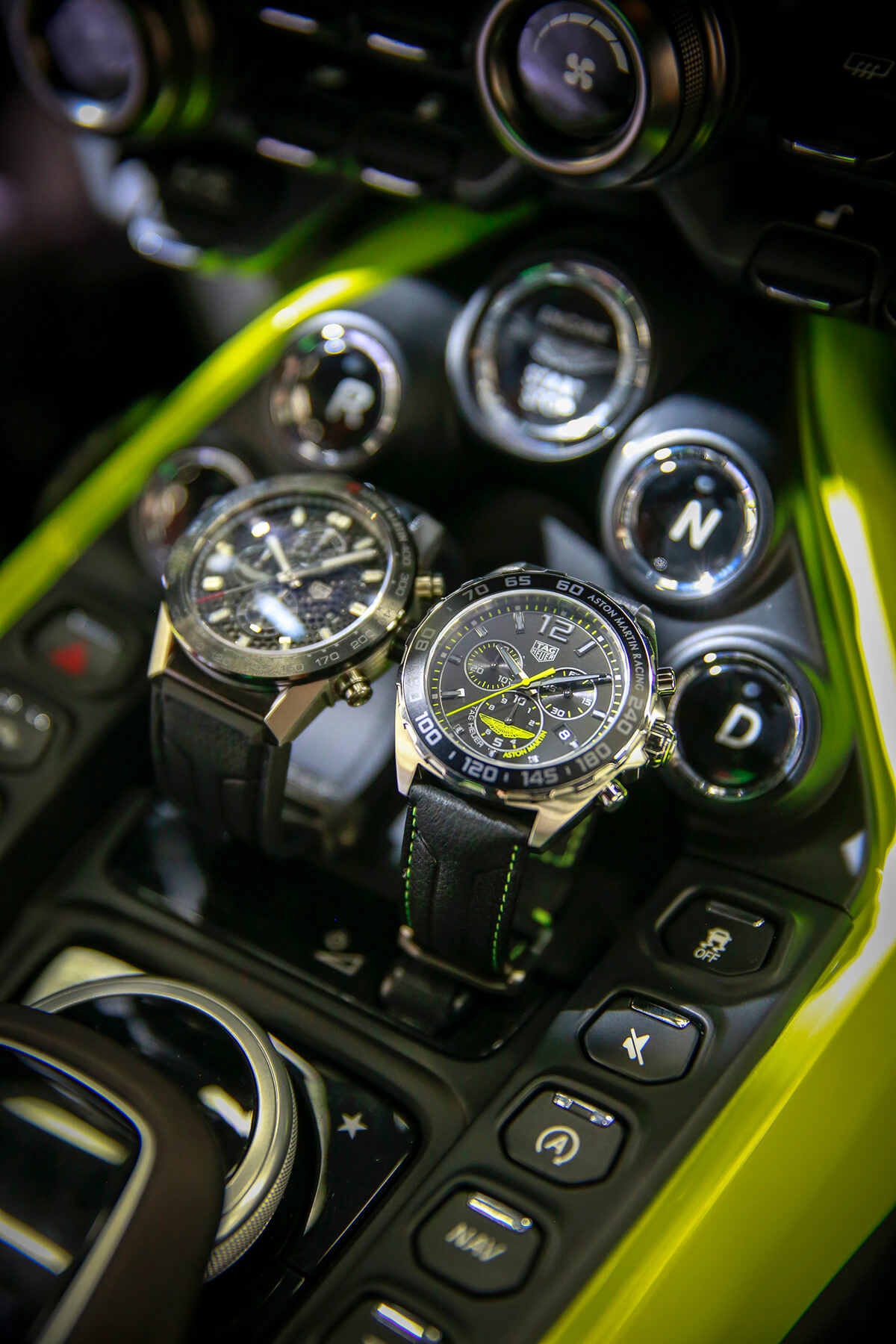 TAG Heuer timepieces shown in the cockpit of a racing car