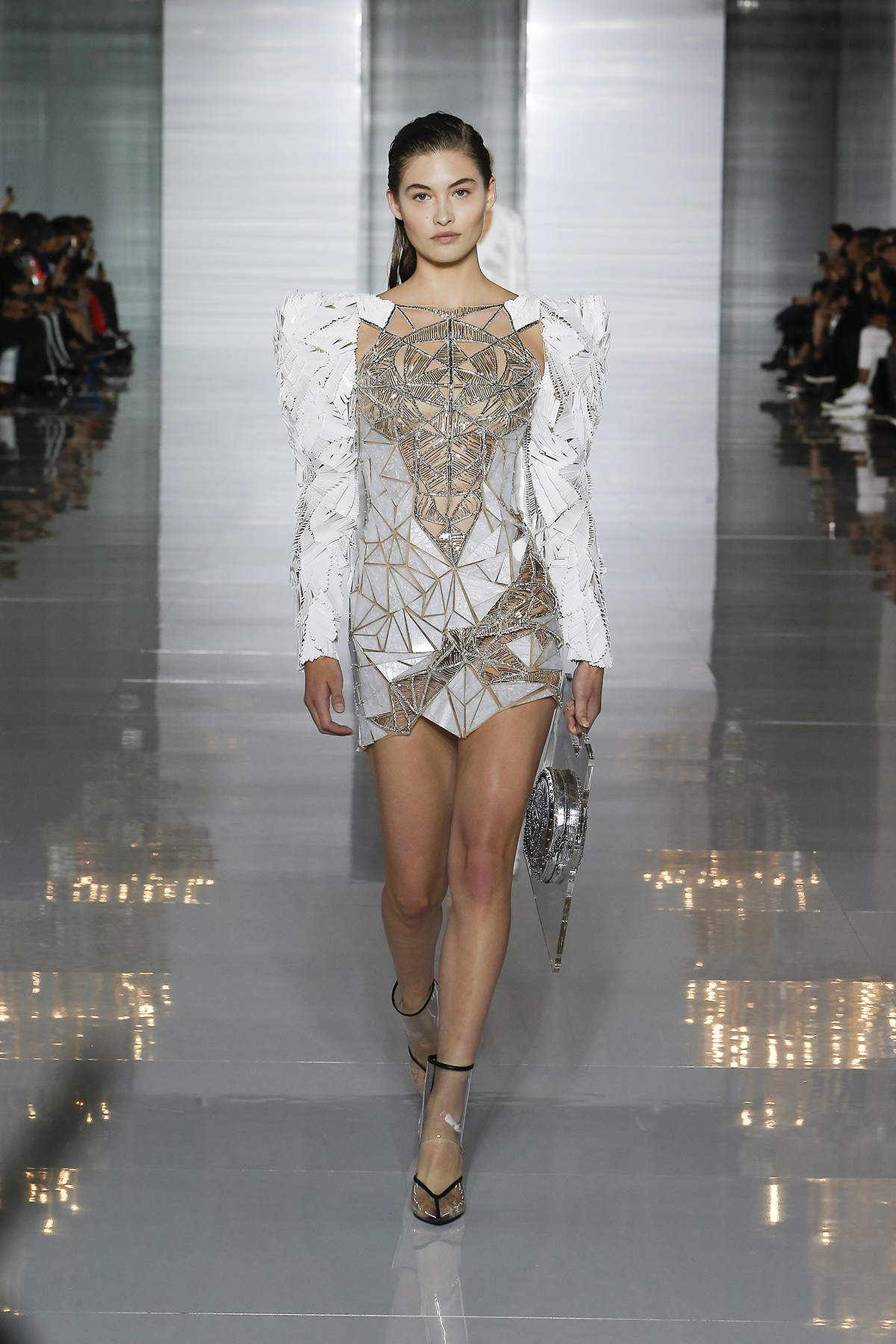 Model on a Balmain catwalk wearing couture dress