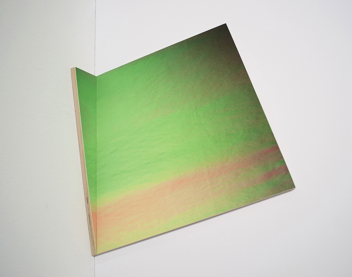 Image of an artwork by Victoria Fu featuring a digital green square bent in one corner