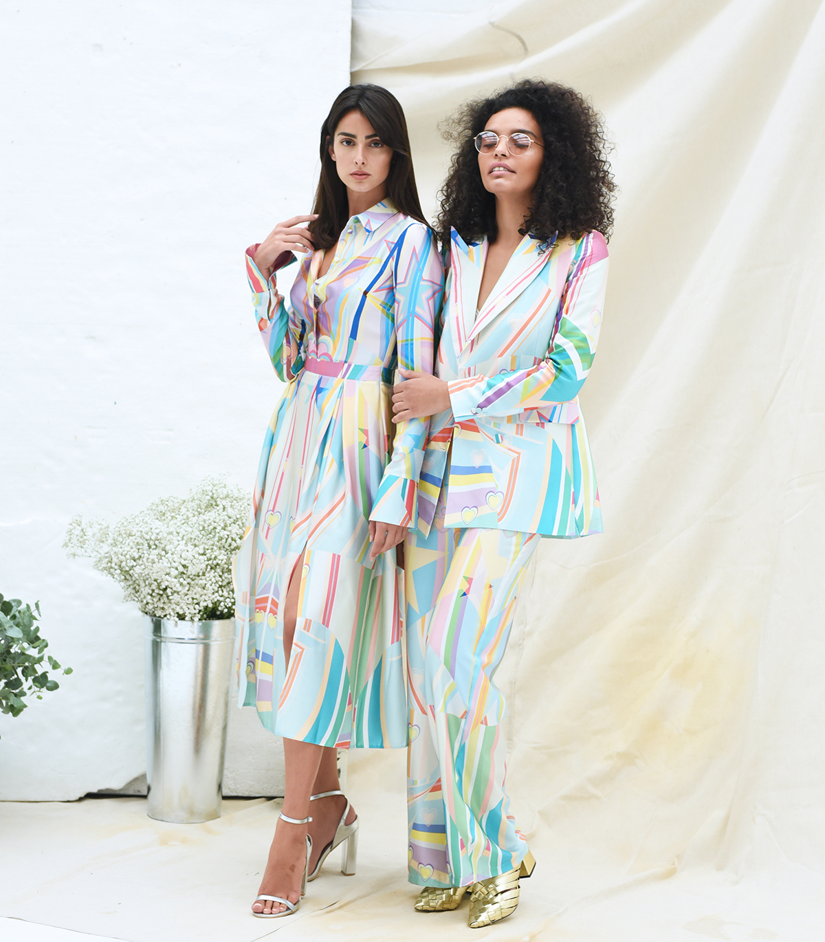 Skeena S lookbook with two models wearing pastel coloured suits