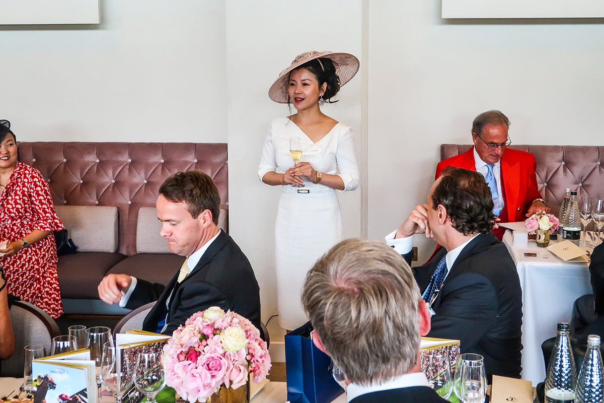 Business woman Vicky Xu speaking at Royal Ascot in 2018
