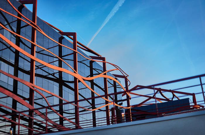 Contemporary architectural steel work on the facade of a glass building