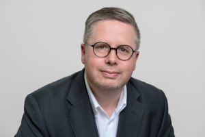 Portrait of a business man wearing glasses